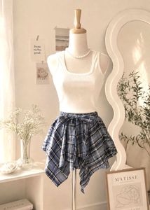Imported Plaid Asymmetry Skort with Bow Detail