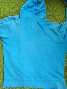Blue Zip-Up Hoodie with Crest Logo