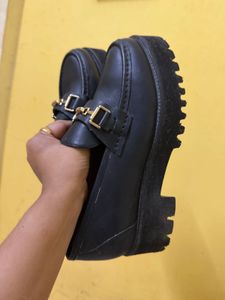 Chic Black Loafers with Gold Accent