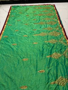 Vibrant Green Silk Saree with Gold Embroidery