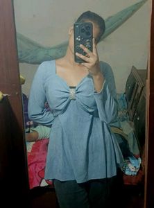 Blue Peplum paded .Top with Long Sleeves