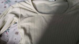 Cream Ribbed Bell Sleeve Peplum Top