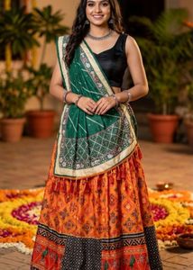 Vibrant Orange Printed semistich Lehenga Choli Set
