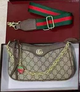 Gucci Monogram Shoulder Bag with Strawberry Charm