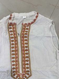 Elegant White Kurta with Embellished Neckline