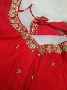 Sleeveless embroidered red blouse