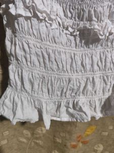 white smocked ruffle crop top