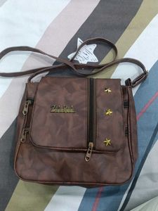 Stylish Brown Crossbody Bag with Star Embellishmen