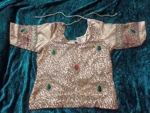 golden lehenga with maroon dupatta