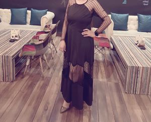 Elegant sheer with net panel evening gown