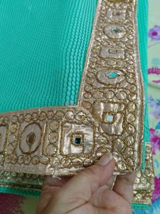 Elegant Teal Saree with Gold Border