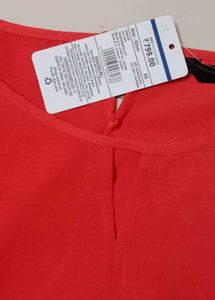 Coral Long Sleeve Top with Ruffled Cuffs