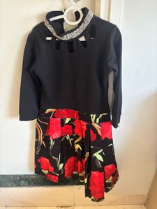 Chic Black Dress with Floral Skirt