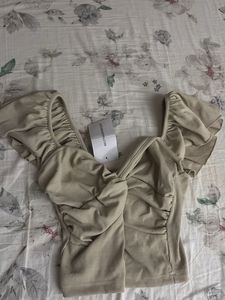 Stylish Beige Ribbed Twist Front Top