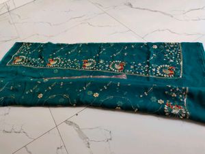 Exquisite Teal Peacock Embroidered Saree