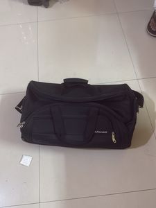 Kamiliant Black Rolling Suitcase