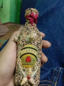 Unique Seashell Decorated Bottle( inside wine)
