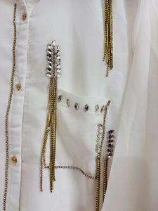 Chic White Tunic with Gold Embellishments