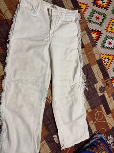 Stylish White Jeans with Fringed Accents