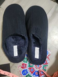 Cozy dark blue knitted slippers