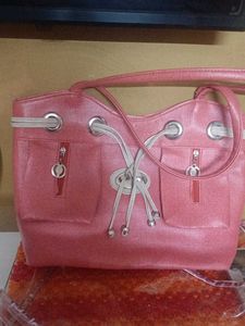 Stylish Pink Handbag with Drawstring Detail