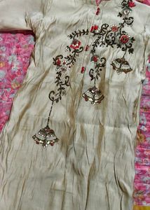 Elegant Beige Kurta with Red Accents