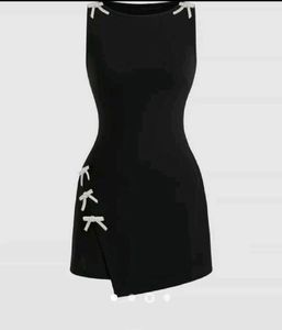 Cute Black Dress with Bow Accents