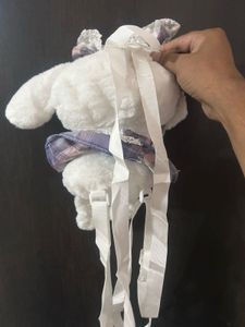 Cinnamoroll backpack wearing a striped dress
