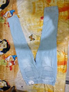 Light Wash Distressed Denim Jeans