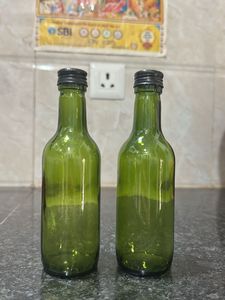 Set of 2 Green Glass Bottles