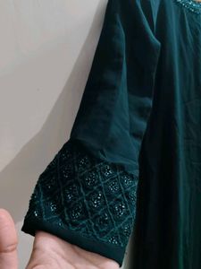 Elegant Green Kurta with Embellished Neckline