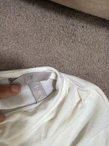 Elegant White cown neck Top