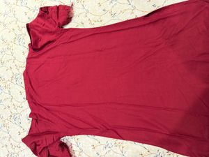 maroon kurta.