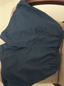 A Navy blue Adidas sports shorts