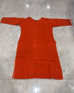 Elegant Orange Kurta with Intricate Embroidery