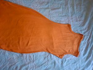 Sleek Orange Sleeveless bodycon Dress. knee length