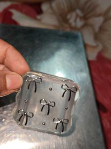 I phone charger cover bow pattern