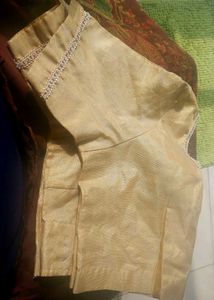 Golden tissue blouse with extra border work