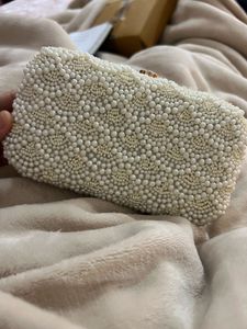 white pearl clutch