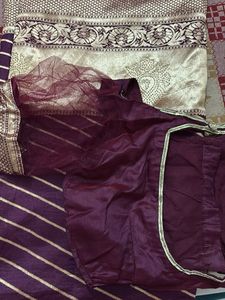 Elegant Purple Saree with Gold Stripes