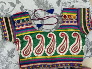 Vibrant Red Embroidered Skirt with dupatta and blo