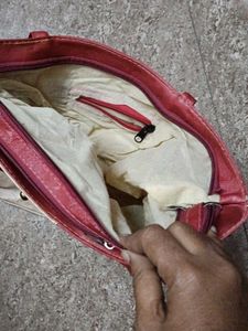 Hand bag, good condition, but one zip problem