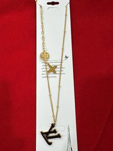 Gold Tone Letter Pendant Necklace