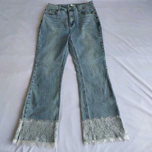 Light Wash Flared Jeans with Lace Trim