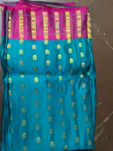Elegant Teal Silk Saree with Gold Motifs