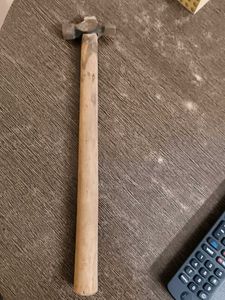 Hammer with wood stick