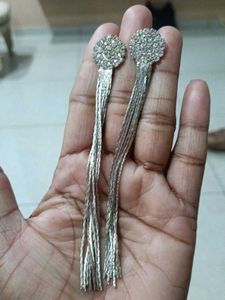 silver toned crystal studded long chain tassel dro