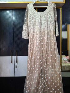 Elegant Beige Embroidered Anarkali gown
