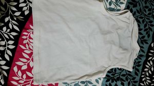Sleeveless White Polo Top