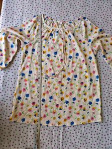Floral top with Red Dhoti Pants